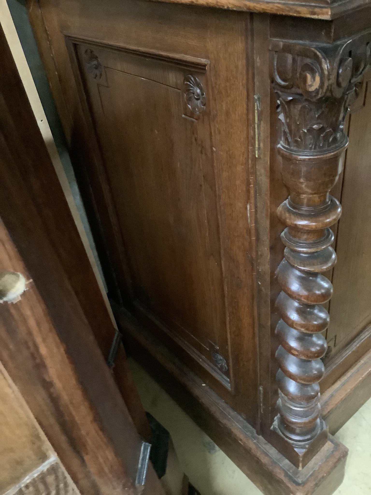 A Victorian oak side cabinet, length 150cm, depth 62cm, height 130cm